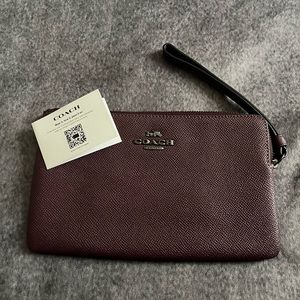 Boysenberry large Coach Wristlet
